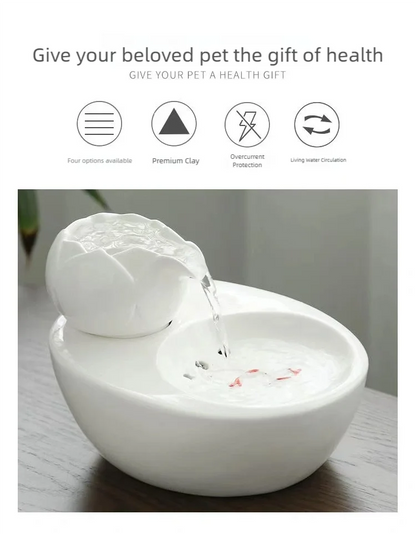 Ceramic pet water fountain with USB pump for cats and other pets to drink water.